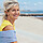 Frau mittleres Alter lachen Strand